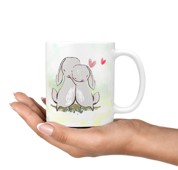 Tasse – Kuschelnde Hasen - Sunnywall - Individualität trifft Design