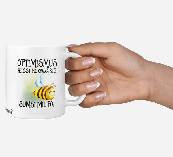 Tasse Kaffeetasse – Optimismus heißt rückwärts Sumsi mit Po – Lustige Bienen-Tasse - Sunnywall - Individualität trifft Design
