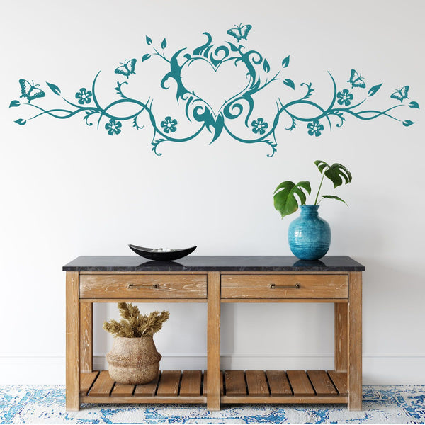 Wandtattoo Blumenranke in Herzform – Florale Verzierungen & Schmetterlinge für Romantik & Naturliebe - Sunnywall - Individualität trifft Design