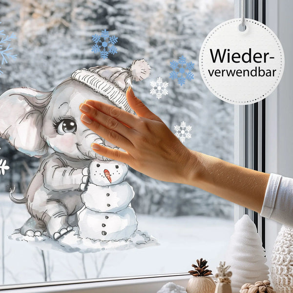 Fensterbild | Süßer Elefant mit Schneemann | Winterliche Fensterbild Dekoration Sunnywall