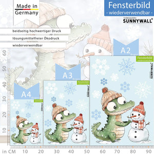 Fensterbild |  niedliches Krokodil mit Schneemann | Winterliche Fensterbild Dekoration Sunnywall