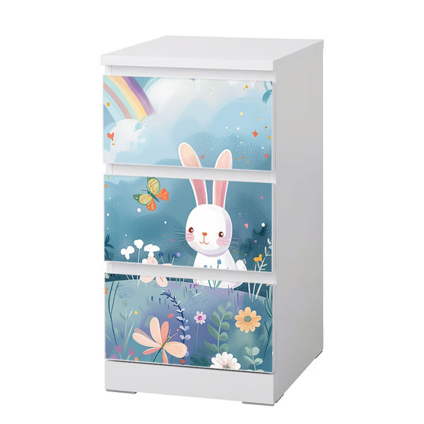 Möbelfolie IKEA Malm Hase – niedliches Design auf Blumenwiese mit Regenbogen - Sunnywall - Individualität trifft Design