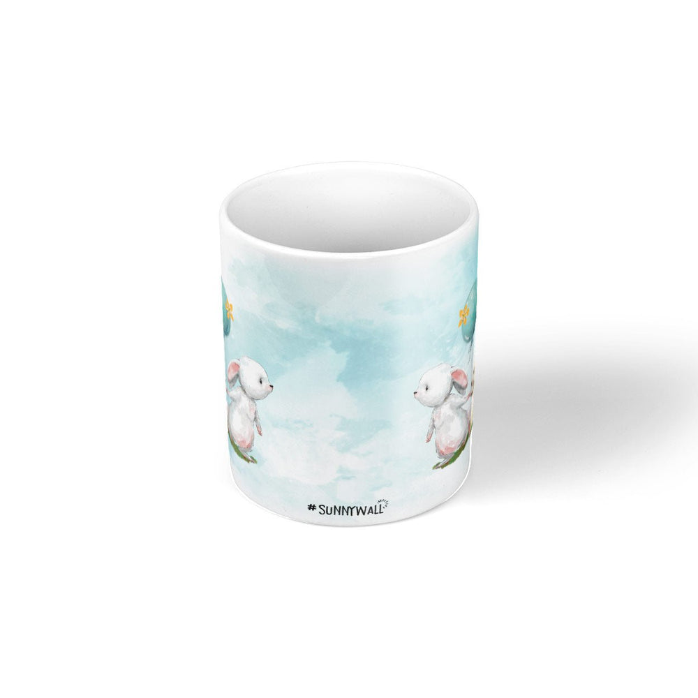 Niedliche Tasse Hase mit Ballon und Buch – Geschenkidee für Tierfreunde - Sunnywall - Individualität trifft Design