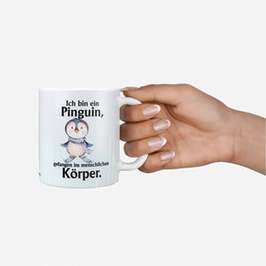 Tasse Kaffeetasse Pinguin mit Spruch - Gefangen im menschlichen Körper - Sunnywall - Individualität trifft Design